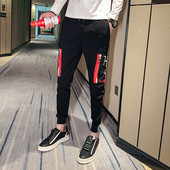 Pantaloni de bărbați la modă în negru cu broderie