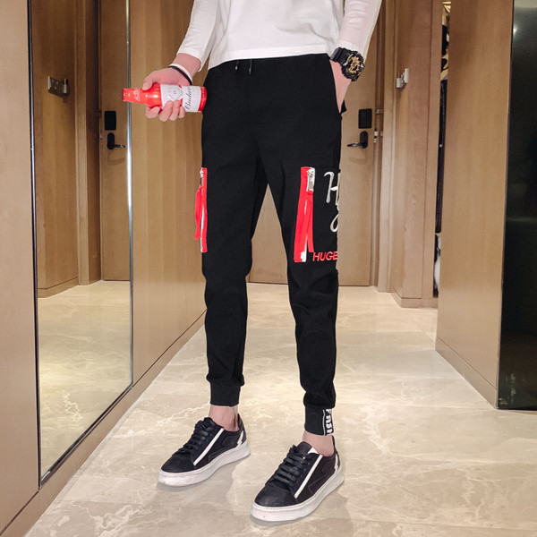 Pantaloni de bărbați la modă în negru cu broderie