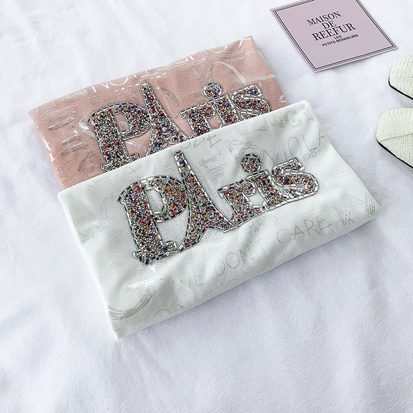 Bluză casual de damă în roz și alb cu mâneci scurte și pietre