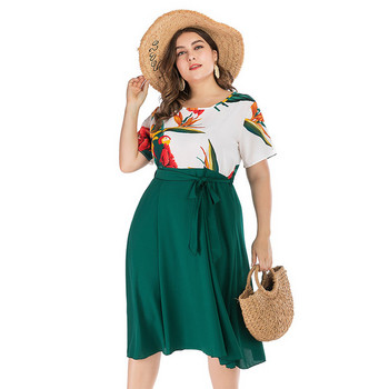 Модерна дамска рокля с къс ръкав и връзки в зелен цвят