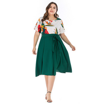 Модерна дамска рокля с къс ръкав и връзки в зелен цвят