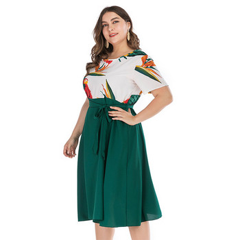 Модерна дамска рокля с къс ръкав и връзки в зелен цвят