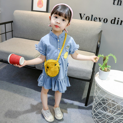 Modern gyerekruha rátéttel és gombokkal