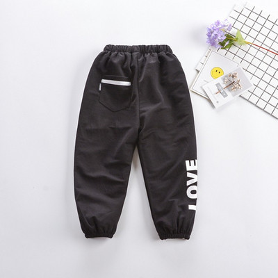 Pantaloni copii cu aplicatie si buzunar in mai multe culori - pentru fete