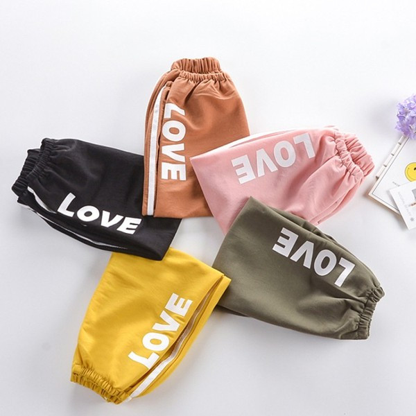 Pantaloni copii cu aplicatie si buzunar in mai multe culori - pentru fete