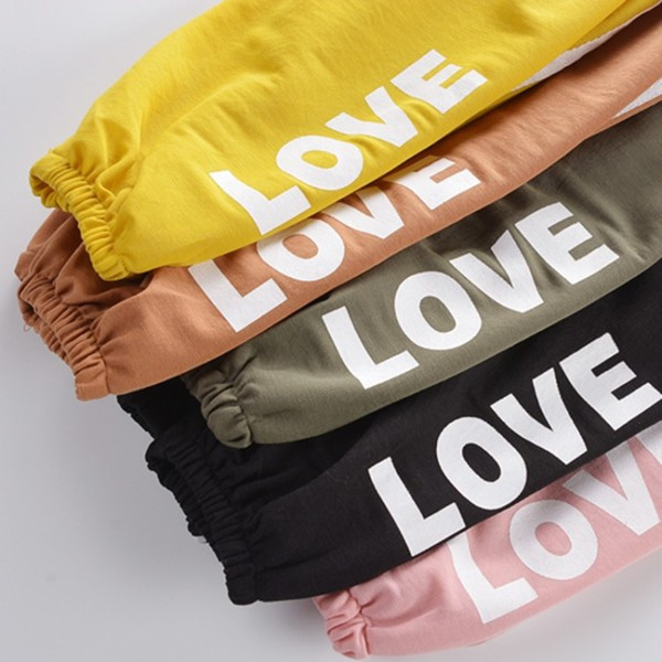 Pantaloni copii cu aplicatie si buzunar in mai multe culori - pentru fete