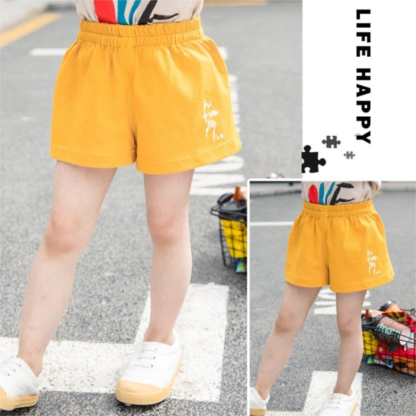 Pantaloni scurți pentru copii în galben pentru fete