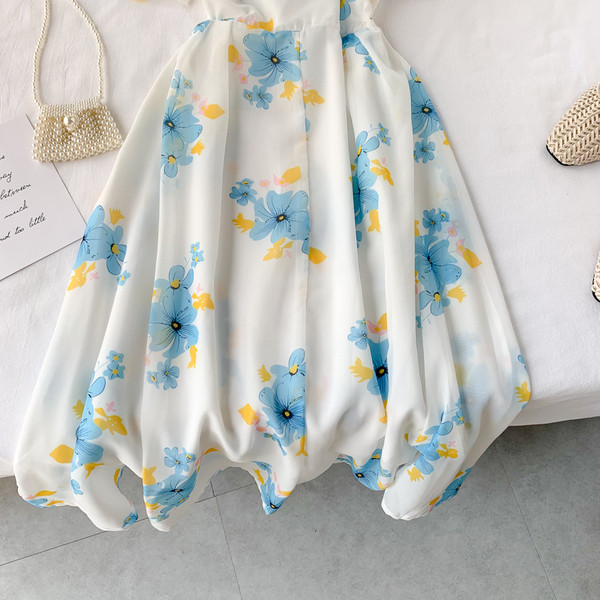 Модерна дамска рокля с флорален десен и V-образно деколте