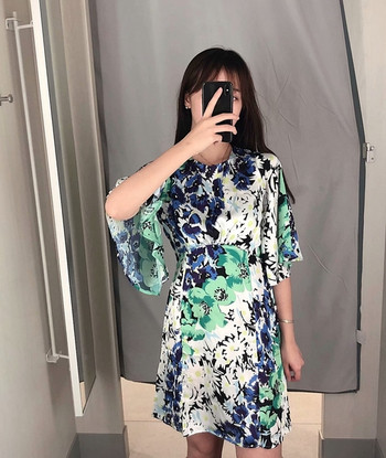 Rochie casual cu maneci lotus si talie elastica cu model floral