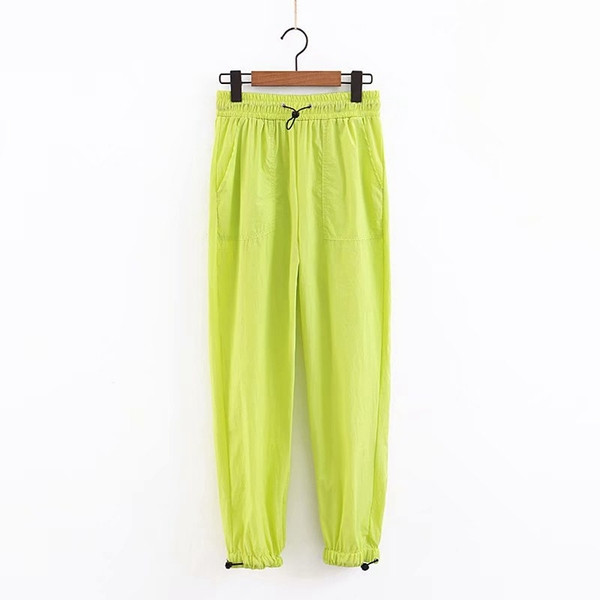 Pantaloni sport de dama cu elastic in talie si glezne de culoare galbena