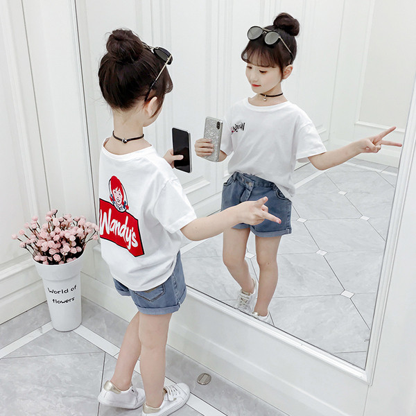 Lezser gyerekblúz lányoknak, rövid ujjú rátéttel, három színben