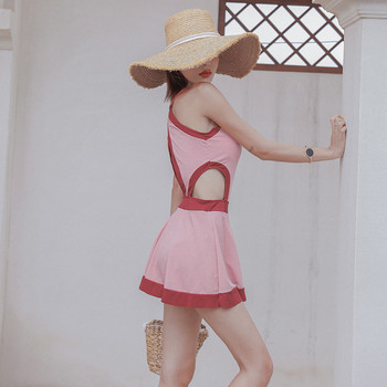 Модерна дамска рокля с изрязани части в розов и сив цвят