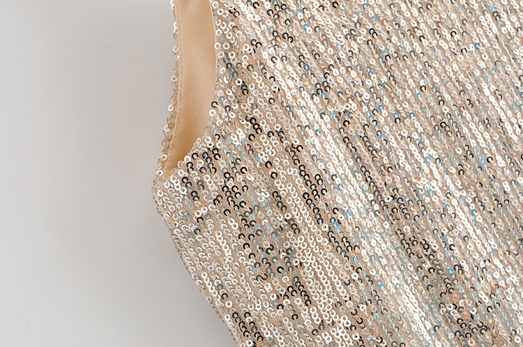 Top de damă elegant de culoare aurie cu paiete