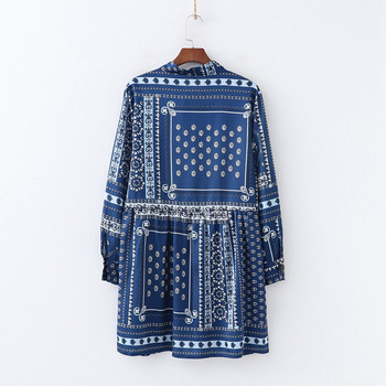 Дамска широка рокля с дълъг ръкав и връзки на врата в син цвят с десен