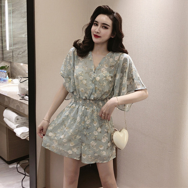 Salopeta scurta de dama cu motive florale in alb si verde