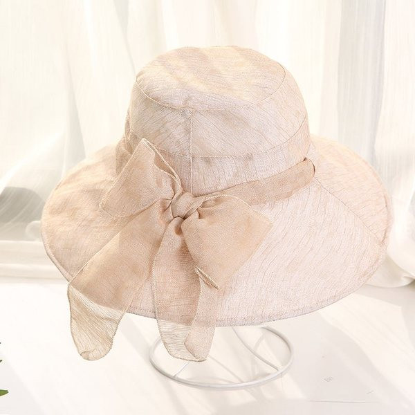 Дамска шапка в четири цвята с панделка