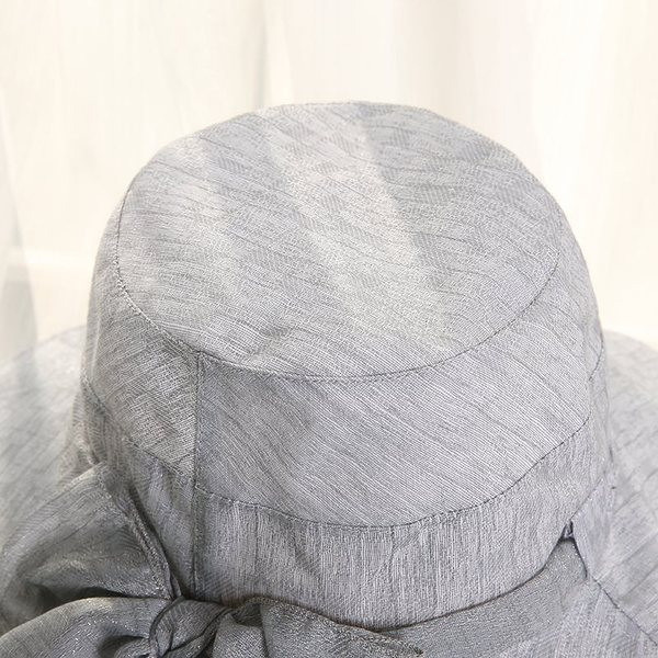 Дамска шапка в четири цвята с панделка