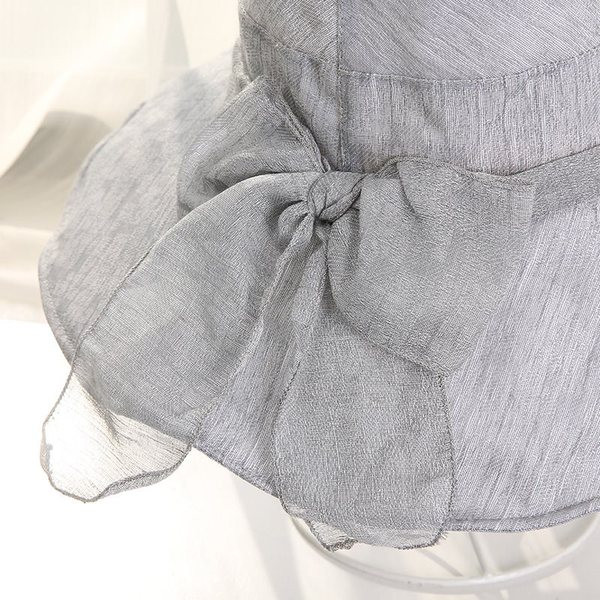 Дамска шапка в четири цвята с панделка