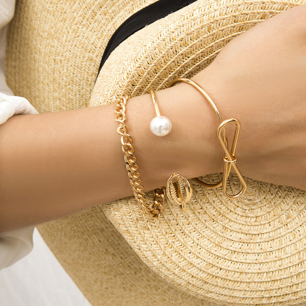 Set de trei brățări de damă din aur și argint