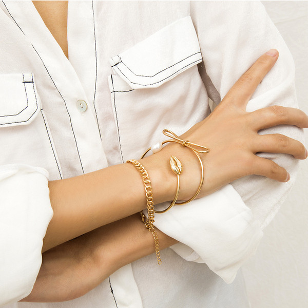 Set de trei brățări de damă din aur și argint