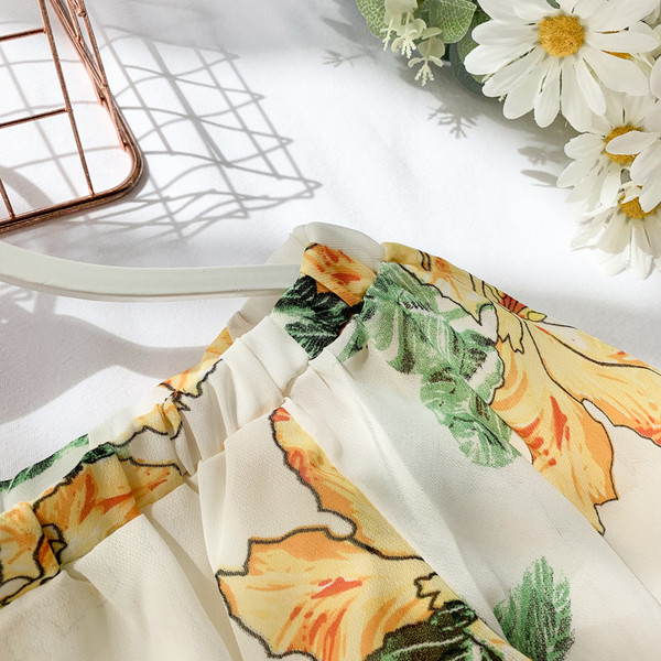 Bluză scurtă de damă cu mâneci lotus și model floral