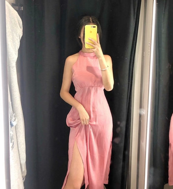 Rochie elegantă de damă cu spatele gol în culoarea roz