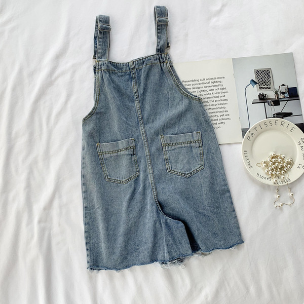 Salopetă casual de damă din denim, cu buzunar și motive rupte