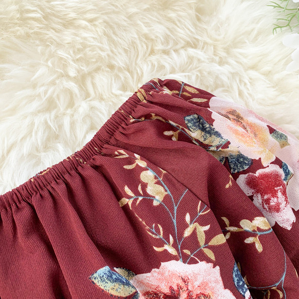 Salopetă de damă modernă cu model floral în roșu