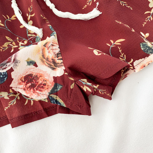 Salopetă de damă modernă cu model floral în roșu