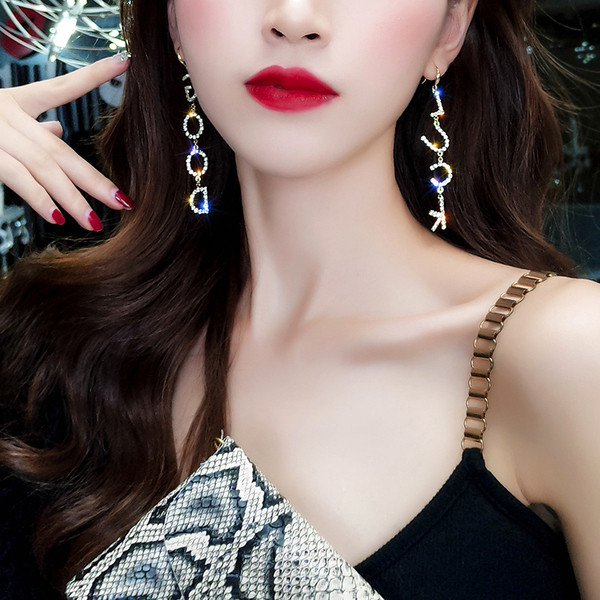 Cercei moderni de dama - in doua culori cu pietre