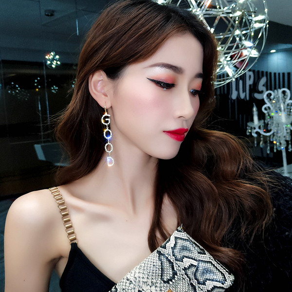 Cercei moderni de dama - in doua culori cu pietre