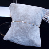 Brățară elegantă de damă, de culoare aurie, cu perle și pietre