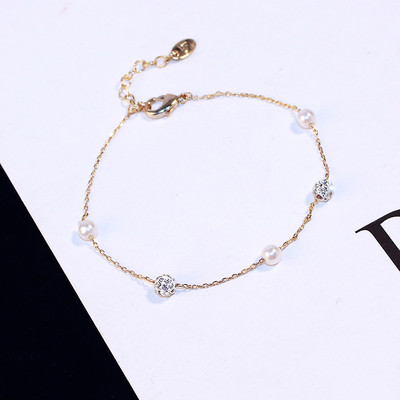 Brățară elegantă de damă, de culoare aurie, cu perle și pietre