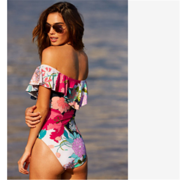 Κομψό μαγιό με floral πριντ και πεσμένα μανίκια