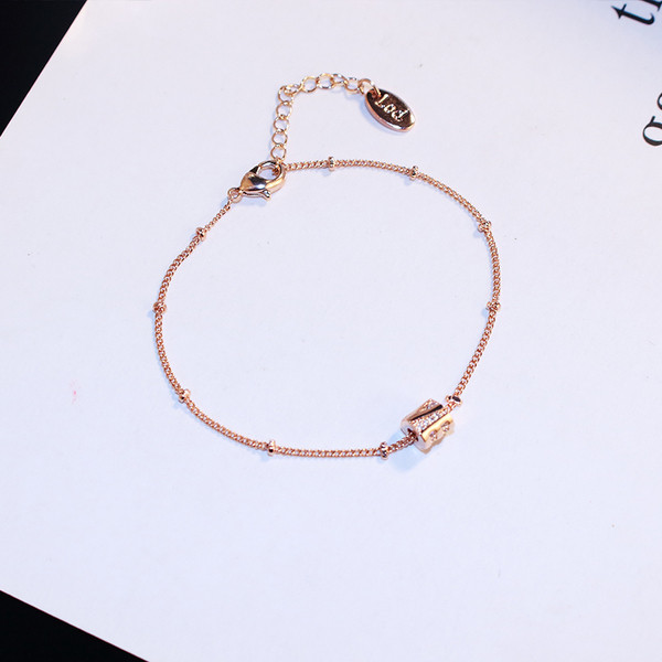 Brățară elegantă de damă în culoarea aurie cu pietre