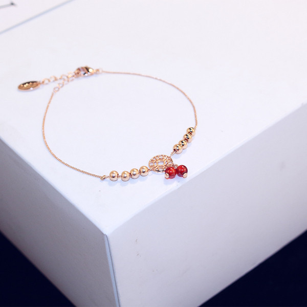 Bratara de dama de culoare aurie cu margele