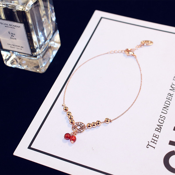 Bratara de dama de culoare aurie cu margele