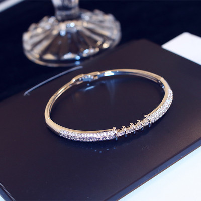 Brățară elegantă de damă în două culori cu pietre