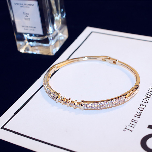 Brățară elegantă de damă în două culori cu pietre