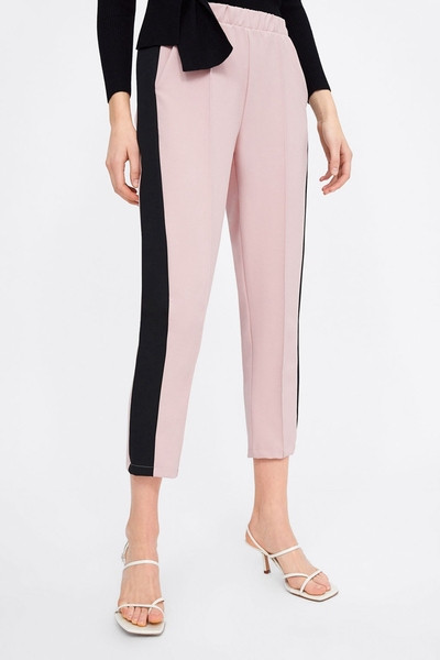 Pantaloni de dama cu talie elastica de culoare roz si margine laterala