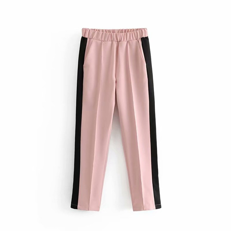 Pantaloni de dama cu talie elastica de culoare roz si margine laterala
