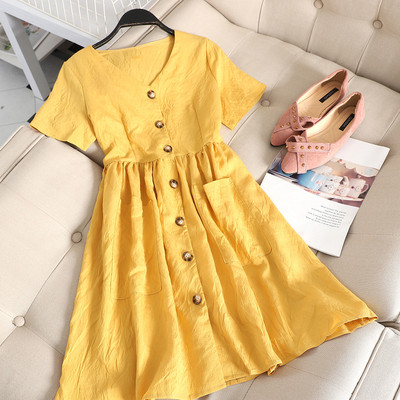 Model actual de rochie de dama cu nasturi in verde, galben si alb