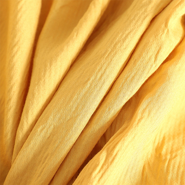 Model actual de rochie de dama cu nasturi in verde, galben si alb