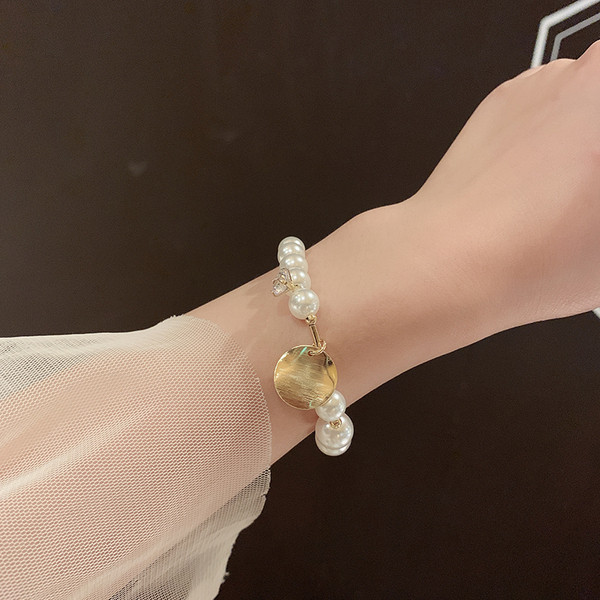 Brățară elegantă de damă-de culoare aurie cu perle