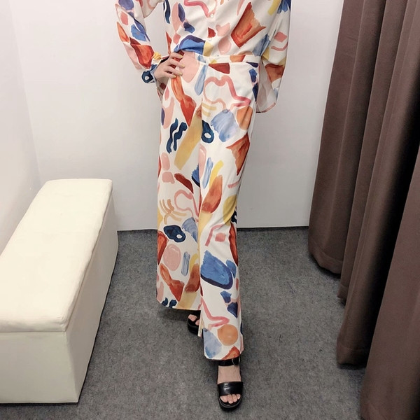 Pantaloni de damă lungi și largi, cu talie și model standard