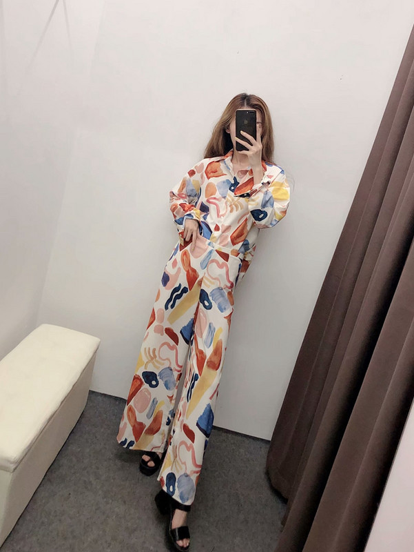 Pantaloni de damă lungi și largi, cu talie și model standard