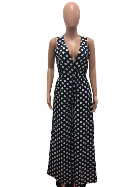 Μοντέρνες γυναικείες ολόσωμες φόρμες σε λευκό, μπλε και μαύρο με βαθύ λαιμόκοψη