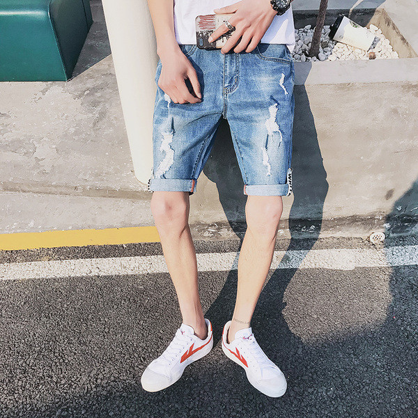 Blugi de bărbați moderni cu motive rupte și buzunare