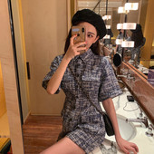 Κομψή γυναικεία  ολόσωμη φόρμα  με κοντό μανίκι με  γιακά σε μπλε χρώμα