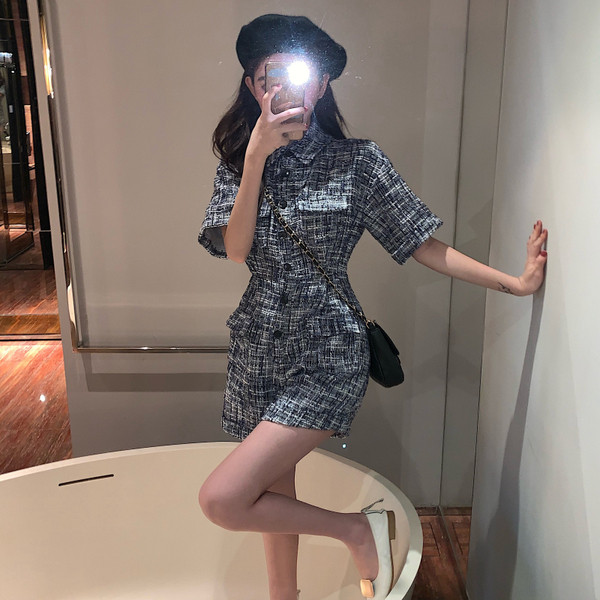 Κομψή γυναικεία  ολόσωμη φόρμα  με κοντό μανίκι με  γιακά σε μπλε χρώμα